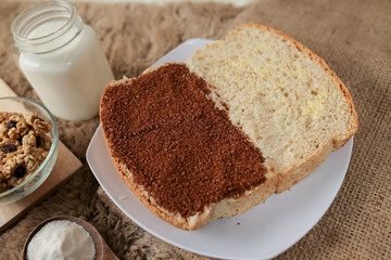 Bread with choco and butter on a plate for breakfast	
