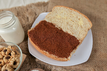 Bread with choco and butter on a plate for breakfast	
