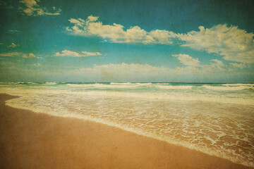 Vintage image of sandy beach landscape. Holiday summer beach background..