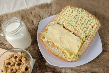 Bread with scrambled egg sandwich on a plate for breakfast and coffee break	
