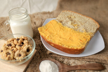 Bread with salted egg spread on a plate for healthy breakfast	

