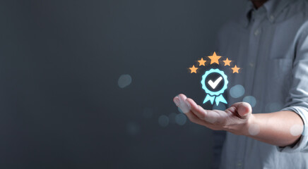 Businessman show standard management with icon on hand. concept of Standard quality control, QC,...