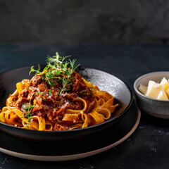 Fettuccine Pasta with Meat Sauce, Herbs, and Parmesan Cheese