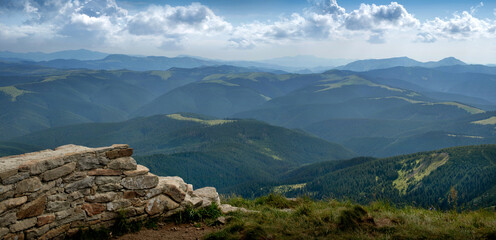 The Chornohirsky ridge from Mount Pip Ivan, silhouettes of the peaks, an aerial view and the...
