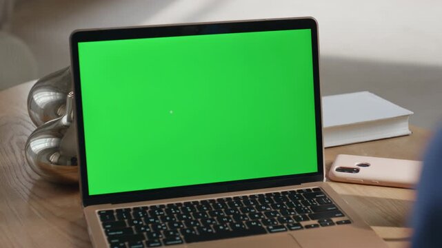 Green screen laptop placed office closeup. Unrecognizable freelancer browsing 