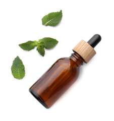 Bottle of essential oil and mint isolated on white, top view