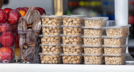 pistachios and nuts on a bar in a cafe