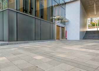 empty concrete ground in front of modern office buildings in downtown. floor for copy space.
