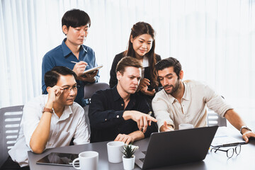 Group of diverse office worker employee working together on strategic business marketing planning in corporate office room. Positive teamwork in business workplace concept. Prudent