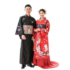 Young couple is posing for their wedding photos in traditional japanese kimonos