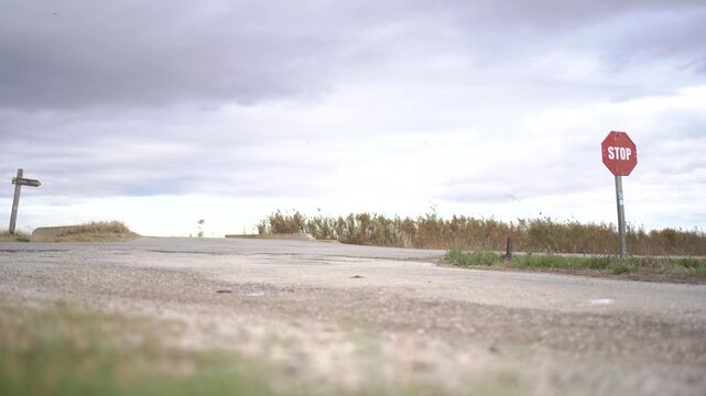 Motorcycle rider in a lonely road