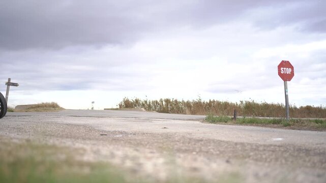 Motorcycle rider in a lonely road
