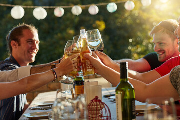 Alcohol, hands and toast with friends outdoor in garden of home for celebration or social gathering together. Champagne, cheers and drinking with group of people in backyard for bonding or milestone