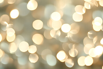 Obraz premium An abstract background of vintage glittering lights in silver and white creates a de-focused, dreamy effect