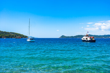 Obraz premium Crystal clear waters of Adriatic Sea around Elaphiti Island Lopud near Dubrovnik. Summer in Croatia