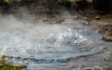 Eruption of a Geysir in Iceland in a hyperthermia area 