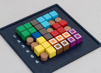 Board logic game for children and adults. The puzzle game.