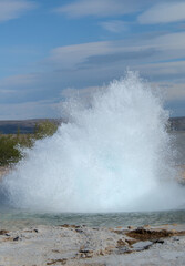 Eruption of a Geysir in Iceland in a hyperthermia area 
