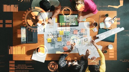 Top down view of civil engineer planning at blueprint. Smart architect team working together to design building construction while sits at meeting with financial chart and statistic graph. Symposium. © InfiniteFlow
