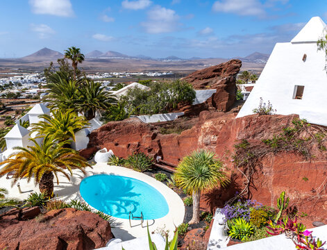 Nazaret, Lanzarote, Canary Islands, Spain - March 19, 2023: Lagomar museum or Casa Omar Sharif with cactus garden and pools, built into rock caves by Cesar Manrique