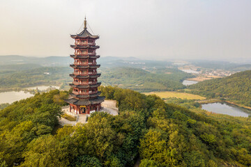China Tower on top of the hill (The text translation is Wenfeng Tower)