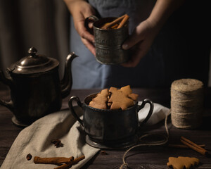 mulled wine, tea in an old vintage silver teapot and a vintage mug with cinnamon