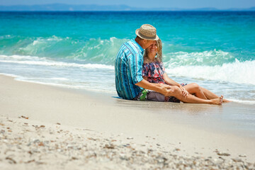 A Happy couple at the seaside vacation travel weekend