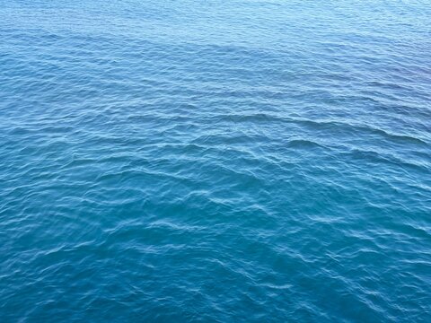 Blue ocean water rippled surface background