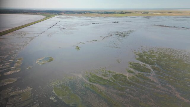 A drone flight over the mudflats near the Romo Island in Denmark. 