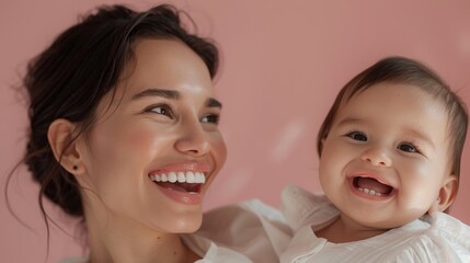 Affectionate studio photo of a mother and her happy baby, radiating love and warmth.