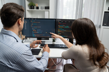 Team skilled developers program coding discussing creative website planning software project on two...