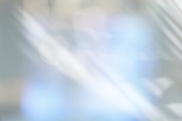 Abstract blur soft focus blinking light beige copy space background. Light and shadow smoke refraction.