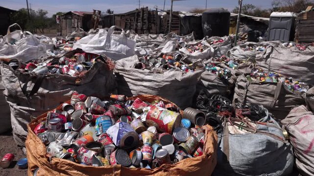 metal cans on a dumpster in Mexico