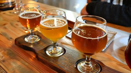 Savor a delightful selection of craft brews while enjoying the ambiance of a rustic brewery on a crisp autumn afternoon