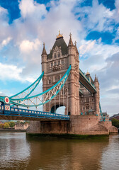 Historic Bridge over River Thames and Cityscape Skyline dramatic sunrise. Tower Bridge in City of London, United Kingdom. Travel Destination.