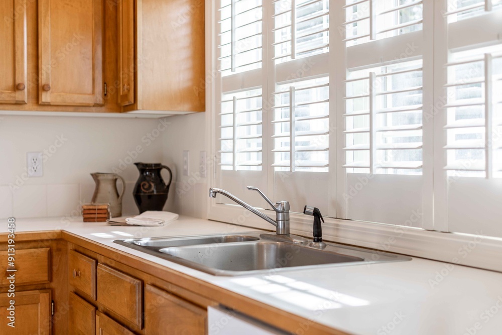 Wall mural kitchen sink with filtered lighting