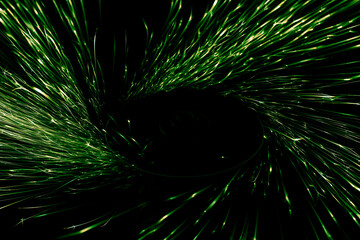 green sparks from the grinder glowing in the dark