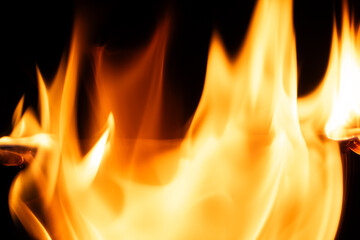 burning paper, glowing edge of paper on a black background.