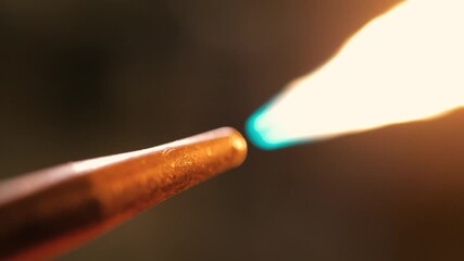 Close up shot of an oxyacetylene torch being fired up