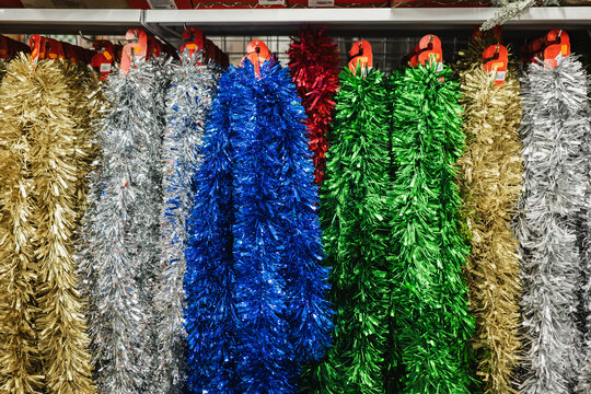 Colorful Christmas tinsel on display at a store