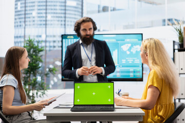 Financial advisor guiding clients in trading shares on forex market using isolated screen device....