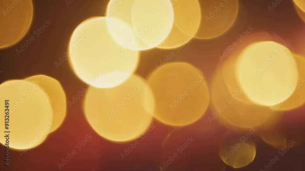 Poster a blurry image of yellow circles with a dark background. the circles are of varying sizes and appear