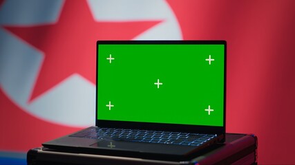 North Korea soldier using radar on green screen laptop to detect missiles during korean conflict....
