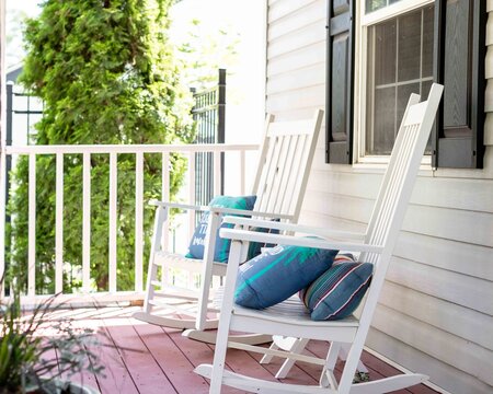 two chairs on the porch