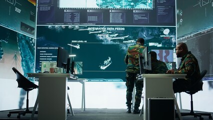 Officer managing surveillance cctv system with data analysis and processing, gathering real time intelligence for strategic military operations. Successful secret service defense mission. Camera B.