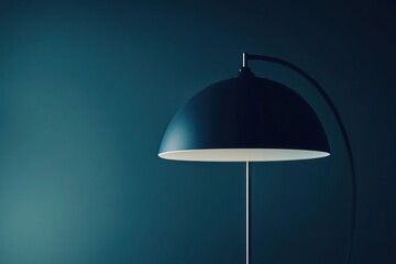 Minimalist Black Lamp Against Teal Wall - A Study in Simplicity and Modern Design