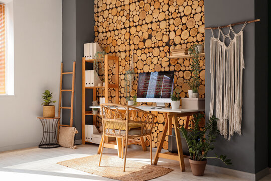 Stylish workplace of programmer with modern computer in light office