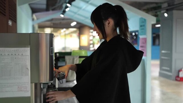 Taiwanese man and woman in their 40s and a South Asian woman in a university cafeteria in Da&rsquo;an District, Taipei City, Taiwan, having a friendly conversation.&nbsp;