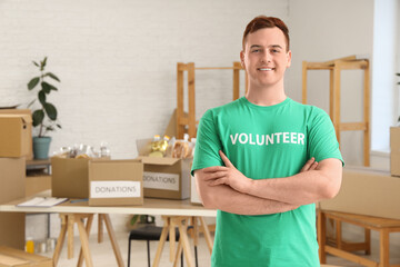 Portrait of male volunteer in center