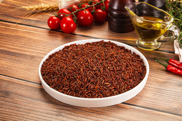 Red raw dry rice gor cooking